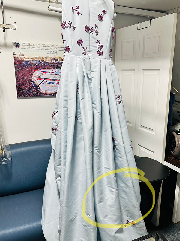 An Oscar De La Renta creation saved masterfully by NcLean Cleaners